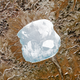 Natural-color satellite image of Lake El’gygytgyn, which sits inside a small asteroid impact crater in eastern Russia near the Arctic Circle. The impact crater is around 3.6 million years old.